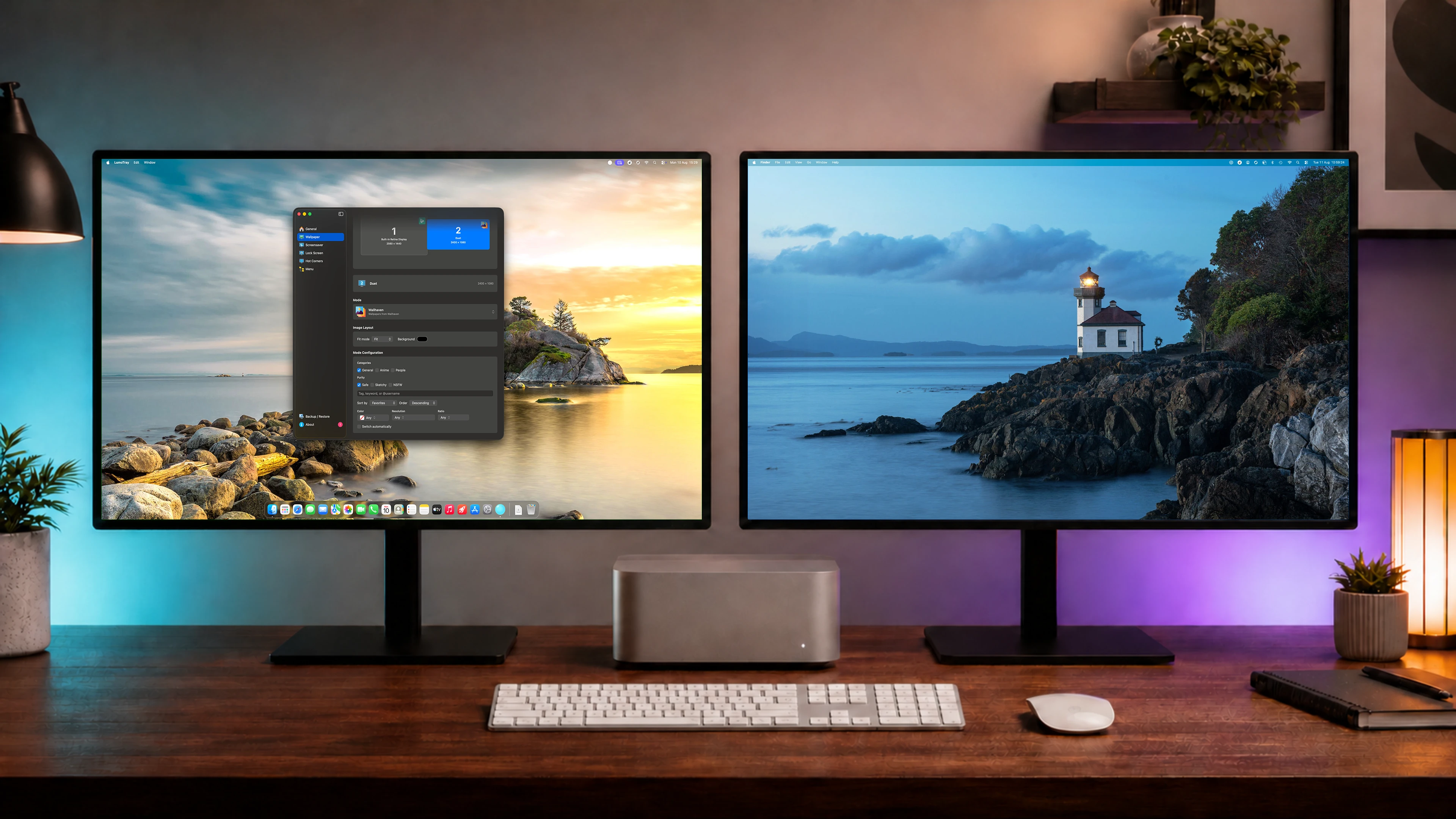 A Mac dual-monitor home office with LumoTray managing different wallpapers on two displays